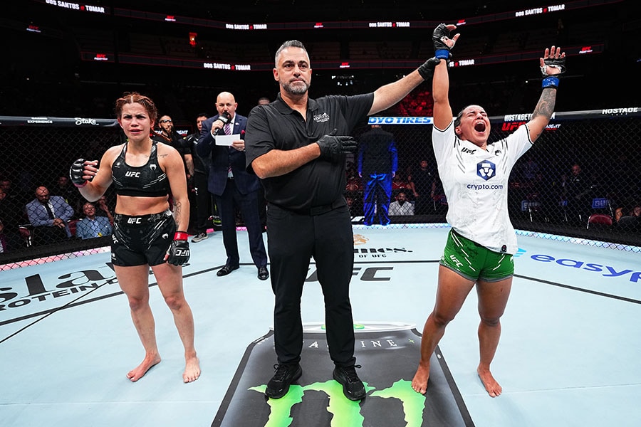 Puja Tomar of India reacts after her victory against Rayanne dos Santos of Brazil in a strawweight fight during the UFC Fight Night event at KFC YUM! Center on June 08, 2024 in Louisville, Kentucky.
Image: Jeff Bottari/Zuffa LLC via Getty Images 