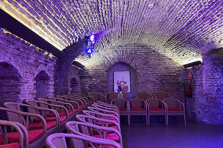 The Spanish guitar's evocative strains, intense footwork, and flamenco artistry create an unforgettable experience at the Flamenco Dance Museum in Seville, where dancers captivate audiences for an hour, immersing them in a whirlwind of sensations. Image: Veidehi Gite