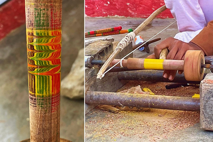 On the left - samples of Rogan art in Nirona Village. On the right - Artist Abdul Gafur shows us a variety of pre-painted Rogan designs.