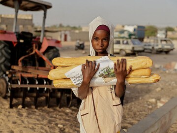 Hunger on the ground, rockets in the sky: Eyecatching photos of the week