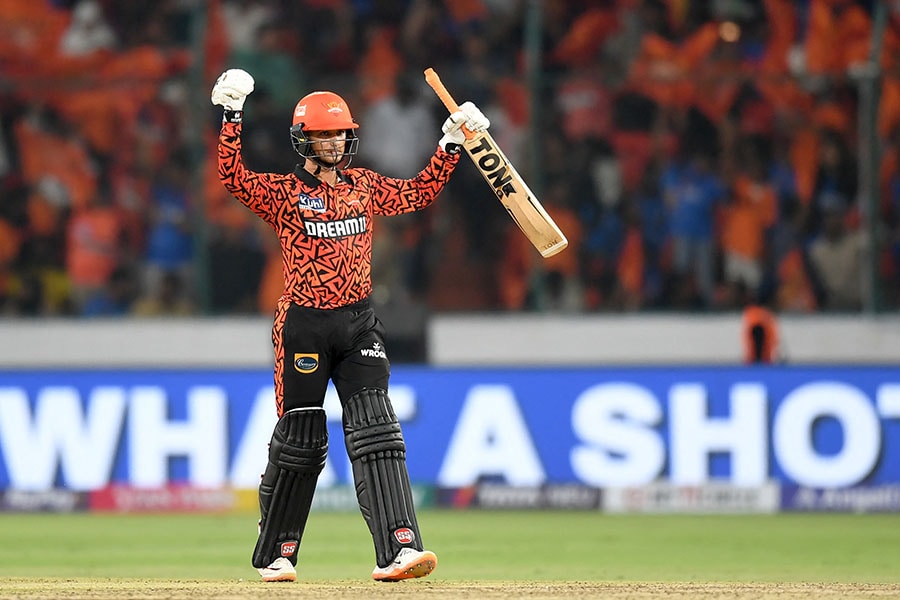 Sunrisers Hyderabad's Abhishek Sharma celebrates after scoring a half-century (50 runs) during the Indian Premier League (IPL) Twenty20 cricket match between Sunrisers Hyderabad and Mumbai Indians at the Rajiv Gandhi International Stadium in Hyderabad on March 27, 2024.
Image: Noah Seelam / AFP 