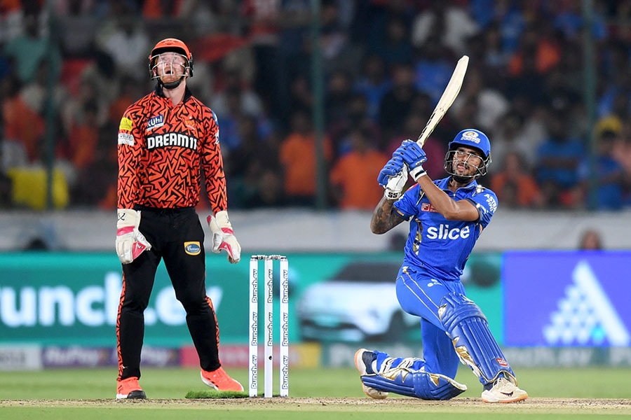 Sunrisers Hyderabad's Abhishek Sharma celebrates after scoring a half-century (50 runs) during the Indian Premier League (IPL) Twenty20 cricket match between Sunrisers Hyderabad and Mumbai Indians at the Rajiv Gandhi International Stadium in Hyderabad on March 27, 2024.
Image: Noah Seelam / AFP 