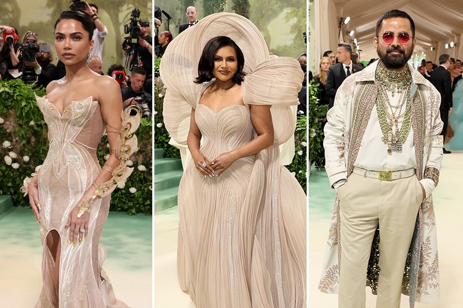 (L-R) Mona Patel in Iris Van Harpen, Mindy Kaling in Gaurav Gupta, and Sabyasachi Mukherjee in one of his creations. Images: Getty Images and AFP