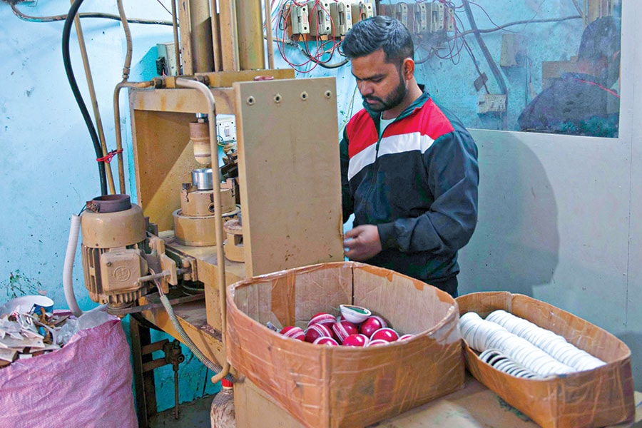 A worker at a Meerut-based manufacturer of cricket balls. The propietor, Mahinder Kumar, took a loan from Aye Finance and was able to scale up his production and revenues
