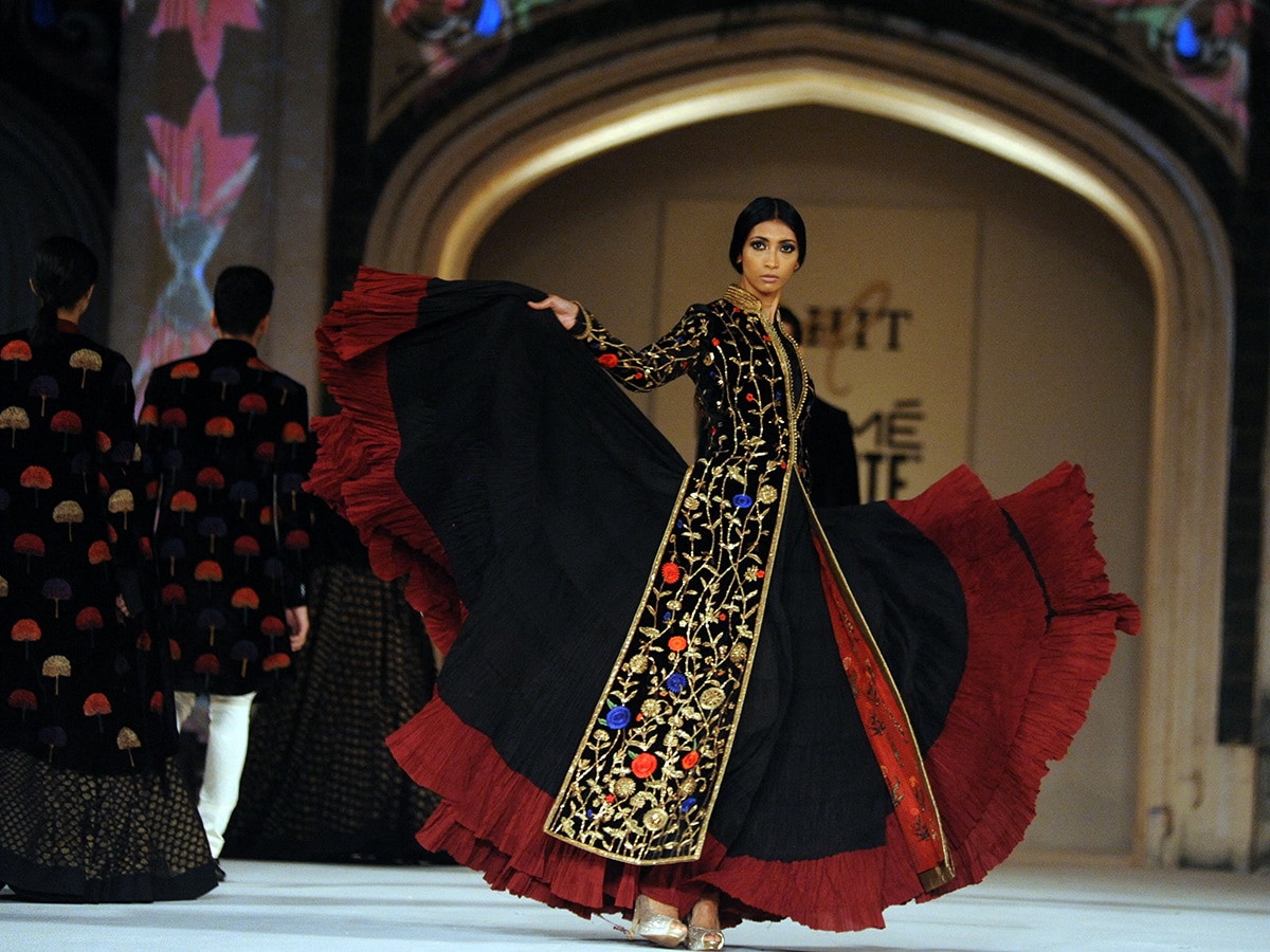 (File) A model showcases a creation by Indian designer Rohit Bal during the final show at Lakme Fashion Week (LFW) summer/resort 2016 in Mumbai on late April 3, 2016. Image: AFP 