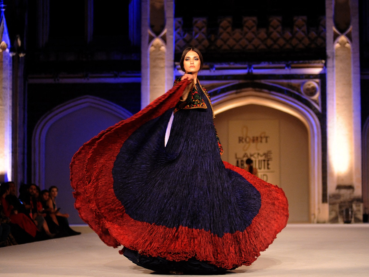 
(File) A model showcases a creation by Indian designer Rohit Bal during the final show at Lakme Fashion Week (LFW) summer/resort 2016 in Mumbai on late April 3, 2016. Image: AFP 