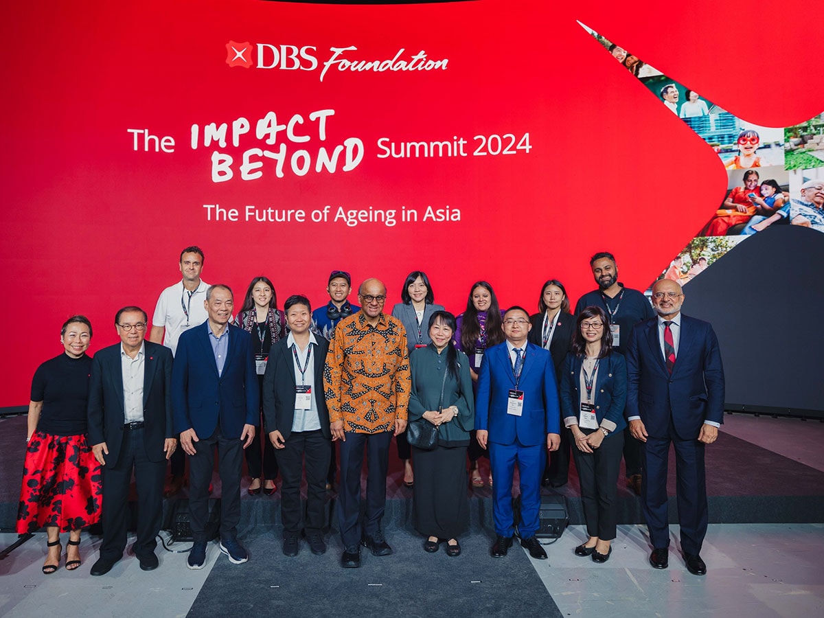 President of the Republic of Singapore Tharman Shanmugaratnam; Ms Jane Ittogi; representatives from DBS and DBS Foundation; and the 10 DBSF honourees. 