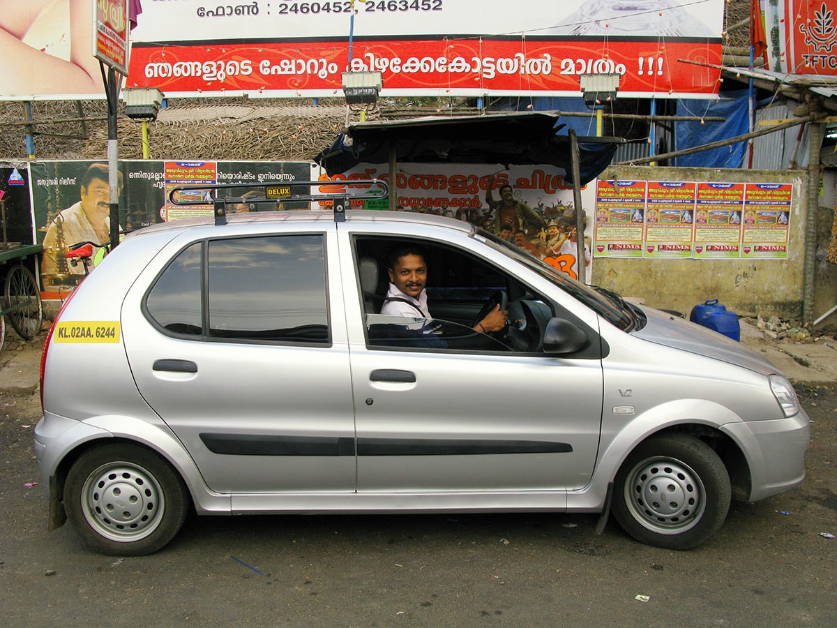 Indian man with his new car model Indica produced by the indian car producer TATA on January 06, 2008 in Trivandrum, India. 
Image: EyesWideOpen/Getty Images