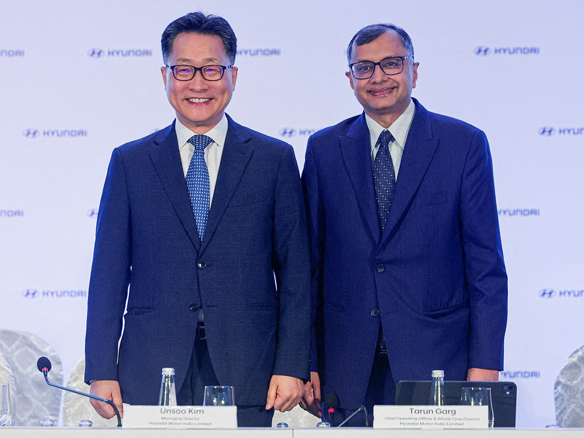 Unsoo Kim, Managing Director of Hyundai Motor India Limited, and Tarun Garg, Chief Operating Officer of Hyundai Motor India Limited, pose for pictures during a press conference, ahead of the company's IPO launch, in Mumbai, India, October 9, 2024.
Image: Reuters/Francis Mascarenhas