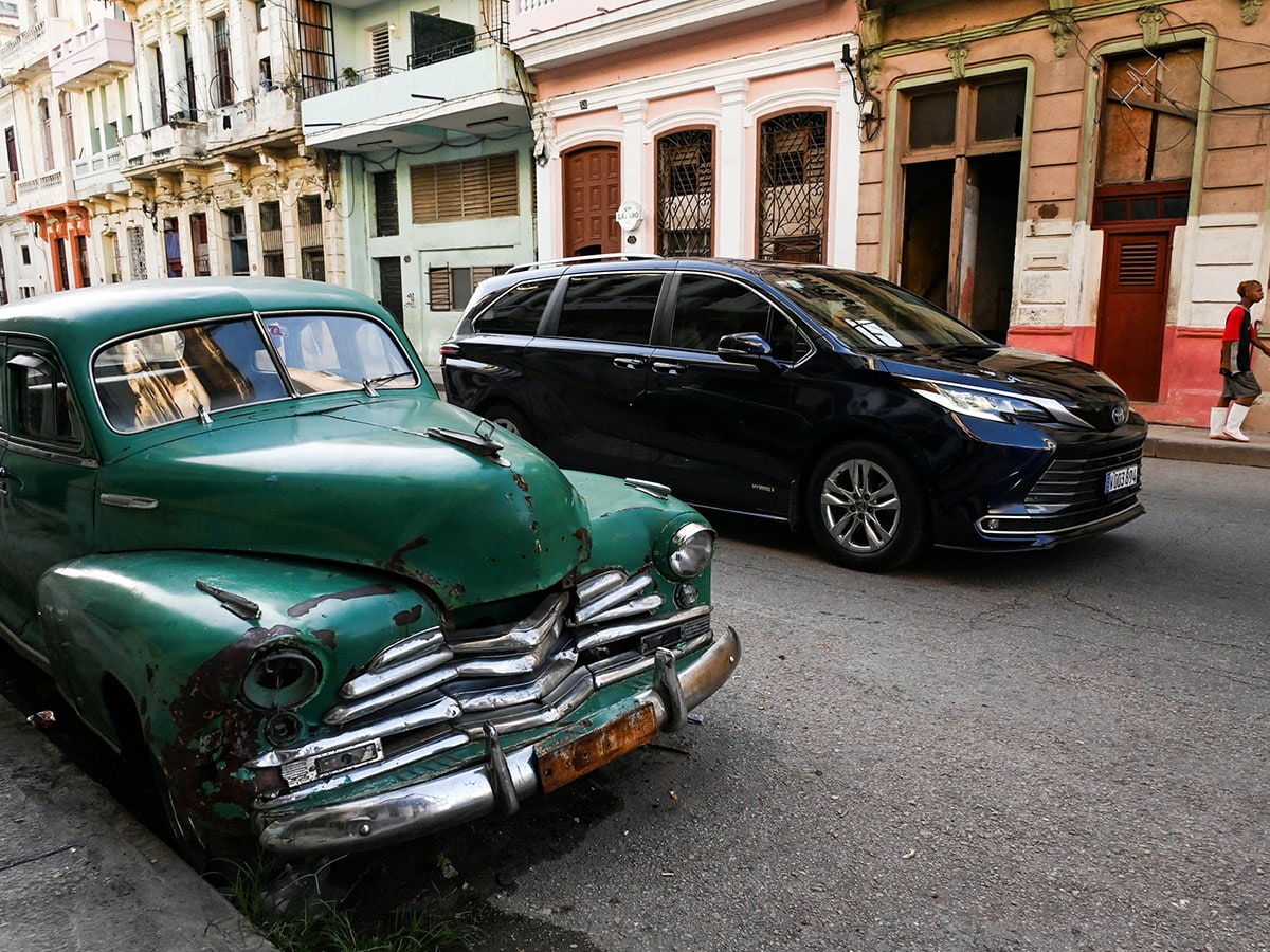 
Tens of thousands of vintage cars—gas-guzzlers older than the average inhabitant—still circulate in Cuba, where many make a living as mechanics keeping the old engines running. 
Image: Yamil Lage / AFP©