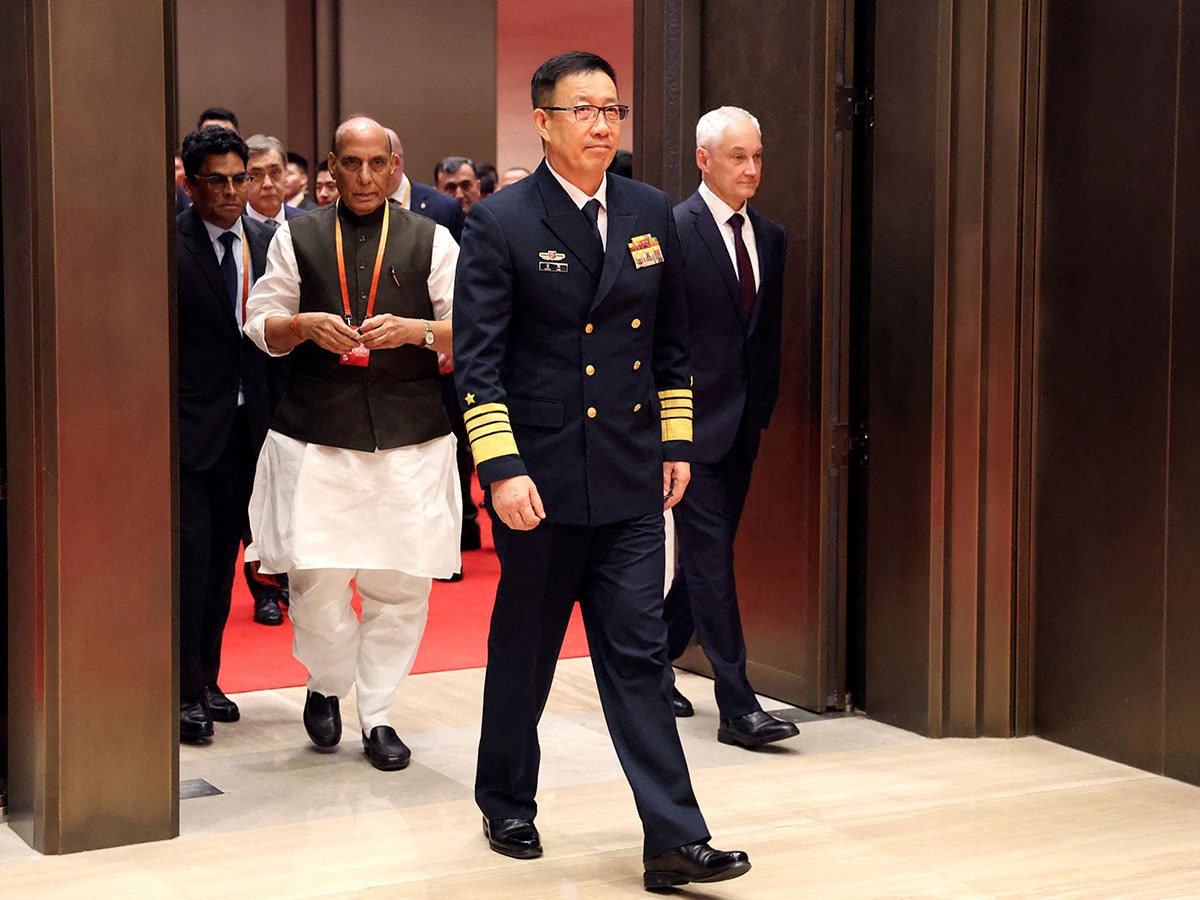 (File) Chinese Defence Minister Dong Jun, Russia's Defence Minister Andrei Belousov and India's Defence Minister Rajnath Singh visit a meeting hall where the 2018 SCO Summit was held, at the Shanghai Cooperation Organisation (SCO) Defence Ministers' Meeting in Qingdao, Shandong province, China June 26, 2025. Photo by REUTERS/Florence Lo