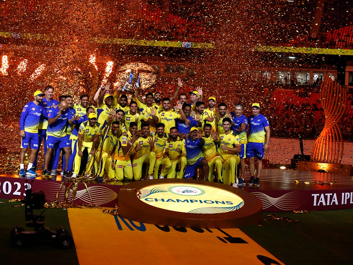 Players of Chennai Super Kings celebrate with the trophy after their victory against the Gujarat Titans in the Indian Premier League (IPL) Twenty20 final cricket match at the Narendra Modi Stadium on May 30, 2023 in Ahmedabad, India. Photo by Pankaj Nangia/Getty Images