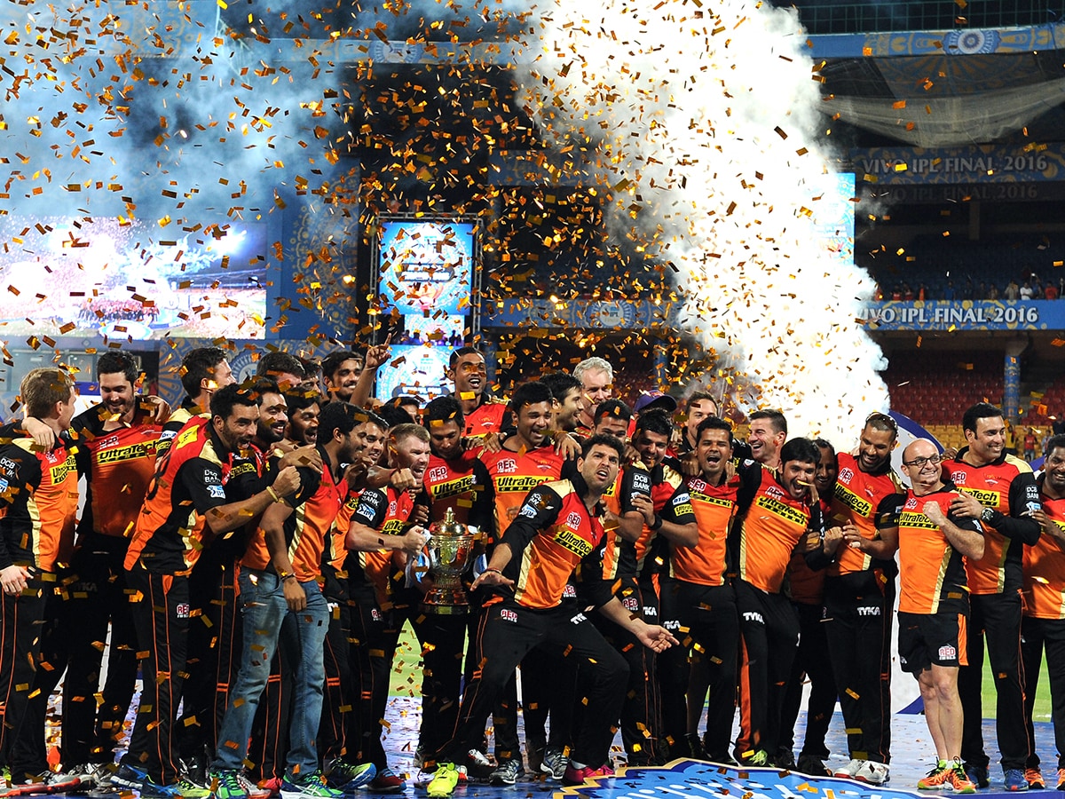 Sunrisers Hyderabad team celebrate, with the trophy, their victory against Royal Challengers Bangalore after the final Twenty20 cricket match of the 2016 Indian Premier League (IPL) between Royal Challengers Bangalore and Sunrisers Hyderabad at The M. Chinnaswamy Stadium in Bangalore on May 29, 2016. Photo by MANJUNATH KIRAN/ AFP