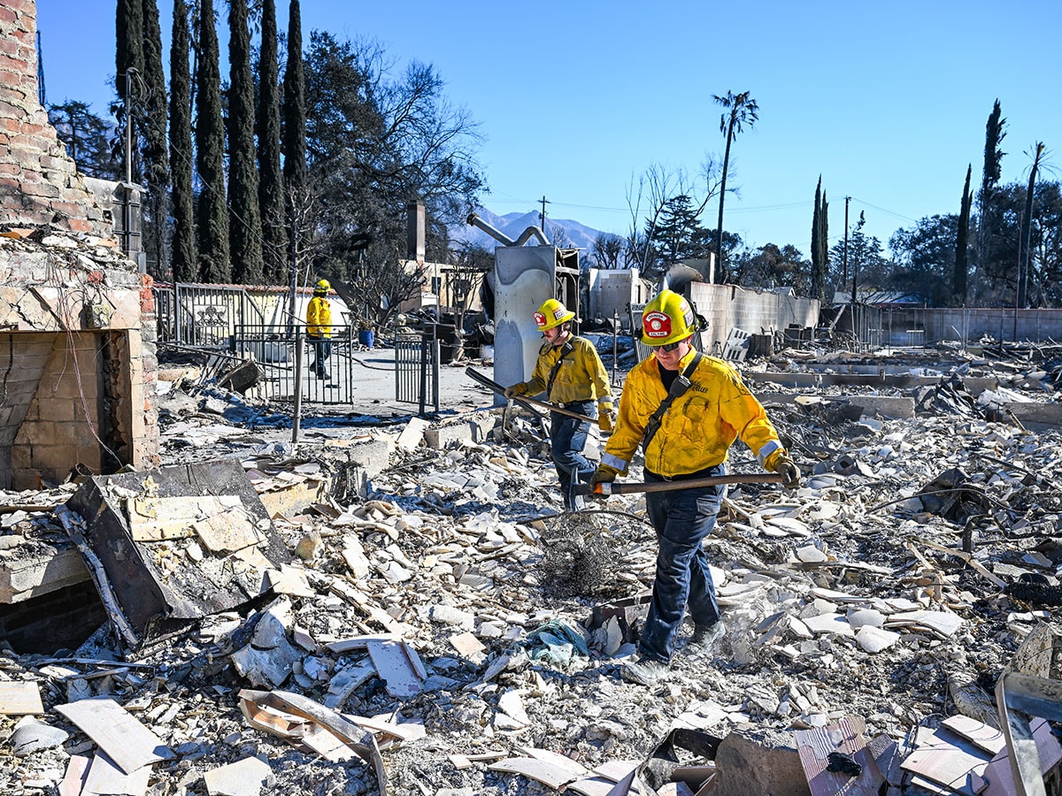 California Fire search and rescue team look through for possible human remains in ashes of burned houses after massive wildfire in Altadena of Los Angeles County, California, United States on January 13, 2025. 
Image: Tayfun Coskun/Anadolu via Getty Images