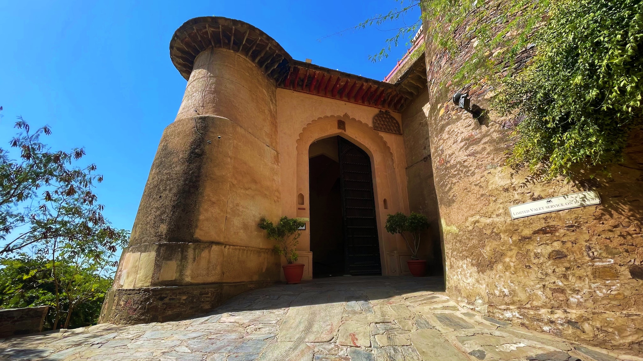 
The Neemrana Fort-Palace has multiple gates, with Surya Pol (the Sun Gate) serving as the main entrance alongside other gates like Jai Pol, Laxman Pol, Chand Pol, Krishen Pol, and Andheri Gate.