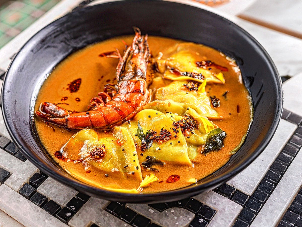 Khandvi Ravioli with a bisque made with prawn shells