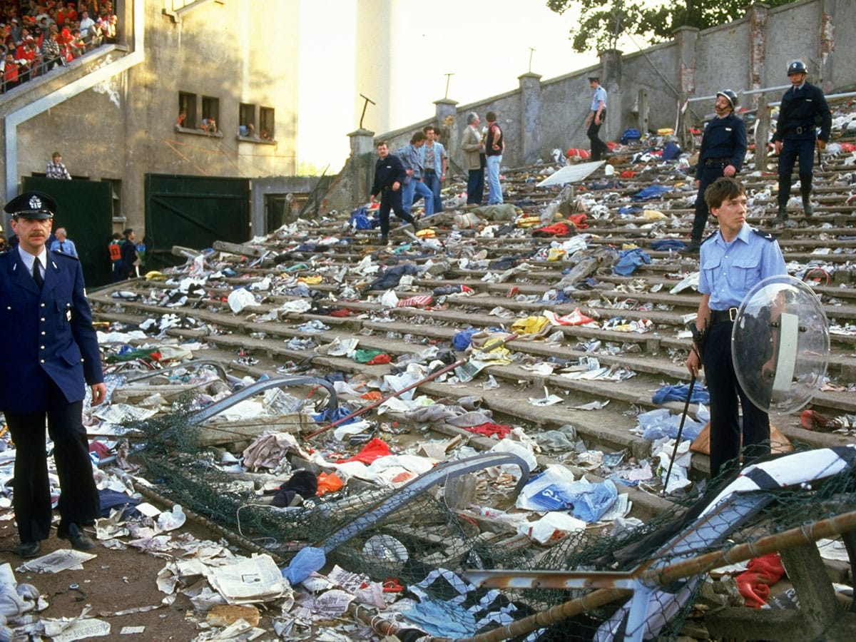 1985:  Ground staff clear the aftermath of the Heysel disaster after the European Cup Final between Liverpool and Juventus at the Heysel Stadium in Brussels, Belgium. It was the last game any English club was allowed to play in Europe for ten years. Juventus won the match 1-0.  \ Mandatory 
Image: David  Cannon/Allsport
