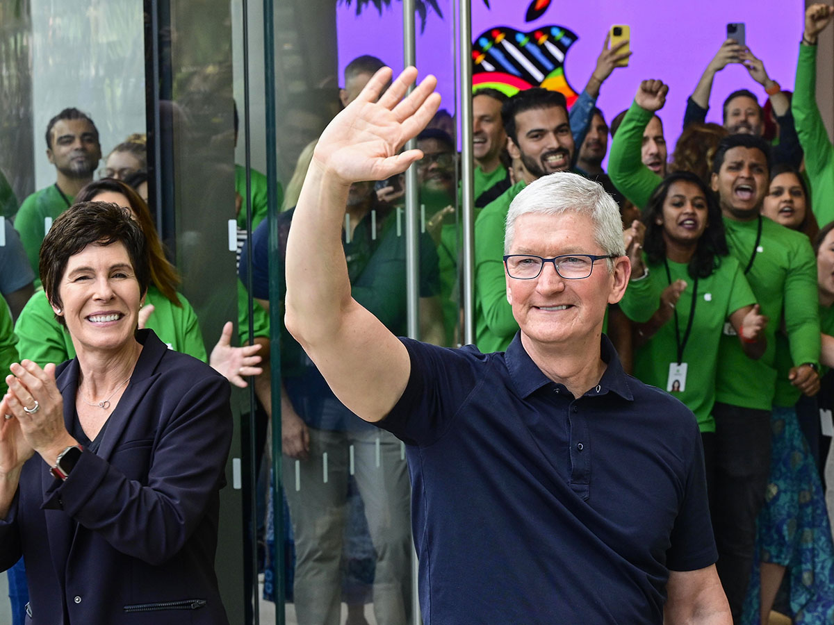 Apple CEO Tim Cook along with Senior Vice-president of retail Deirdre O'Brien,(L), during inauguration of 