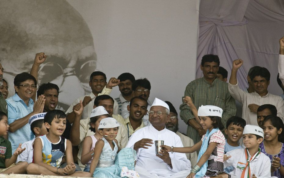 Anna’s supporters are jubilant after he breaks his fast with coconut water on August 28       