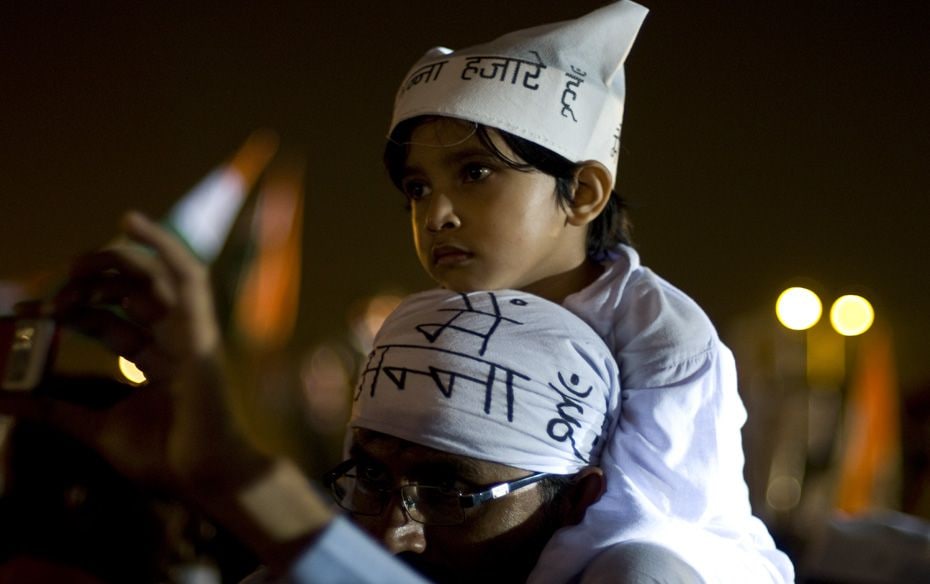  A father and son show their support to Anna at the Ramlila ground                             