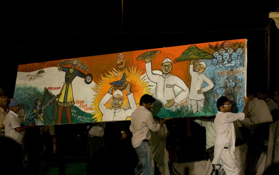 A painting depicting Anna as Lord Ram and Lord Krishna being carried by his supporters              