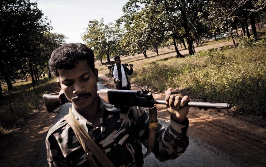 Special Police Offi cers (SPOs) patrol the jungles in Bijapur, Chhattisgarh. The state government&rs