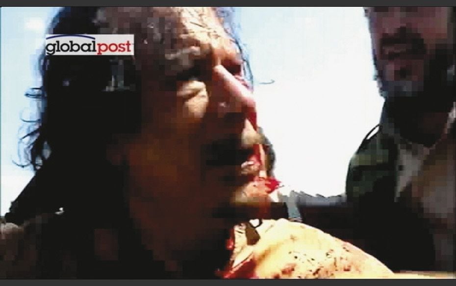 The EndA grab from local TV shows fallen Libyan dictator, Muammar Gaddafi, just after his capture by