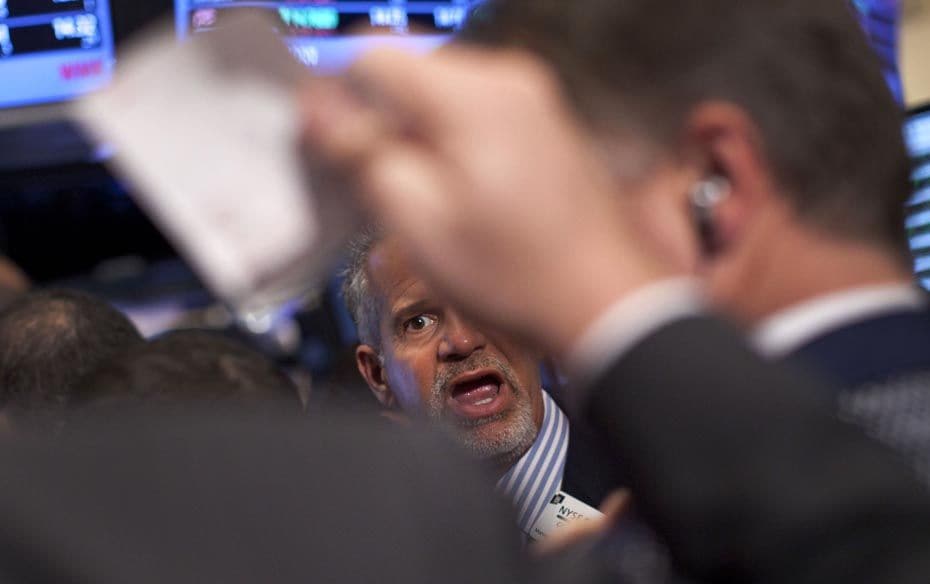 A trader at the New York Stock Exchange after trading ended for the day on December 12, when markets