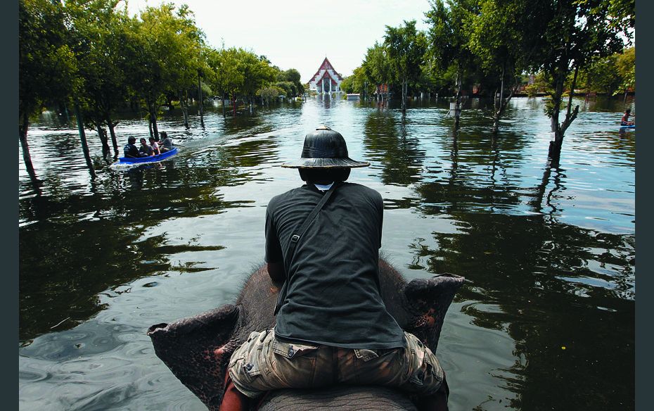 Water wayThailand was hit by its worst floods in decades, (and is still being battered). Here, a mah