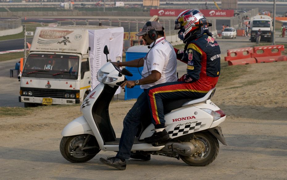 He makes a sorry exit as he leaves on the back of a scooterette                        