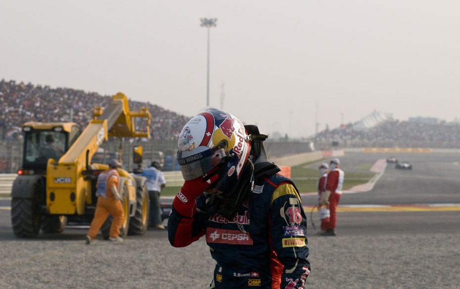 Buemi is close to tears as he wipes his eyes                        