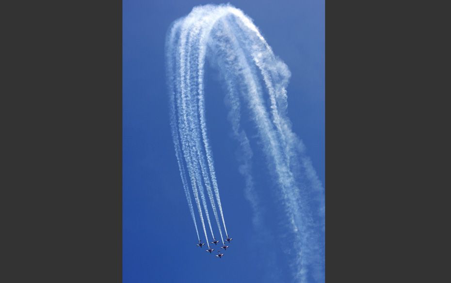 Royal Australian Air Force (RAAF) Roulettes aerobatic display team performs with their Pilatus PC-9 