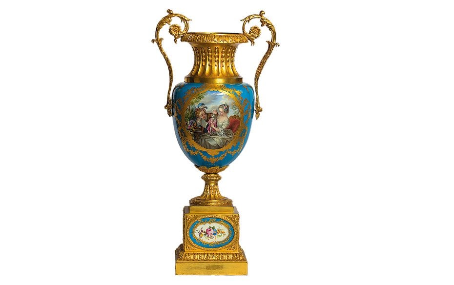 One of a pair of extremely rare and superb porcelain vases with the original gold gilt ormolu mounts