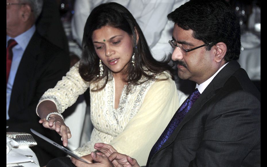 Kumar Mangalam Birla, chairman of the Aditya Birla Group, and wife Neerja vote for one of the speake