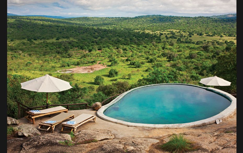 UGANDA The pool with a superb view from Mihingo Lodge situated on an extensive rock outcrop just out