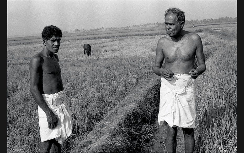  Rajan often shot Thakazhi in Kerala, and, in the image above,  we see the writer working with a far