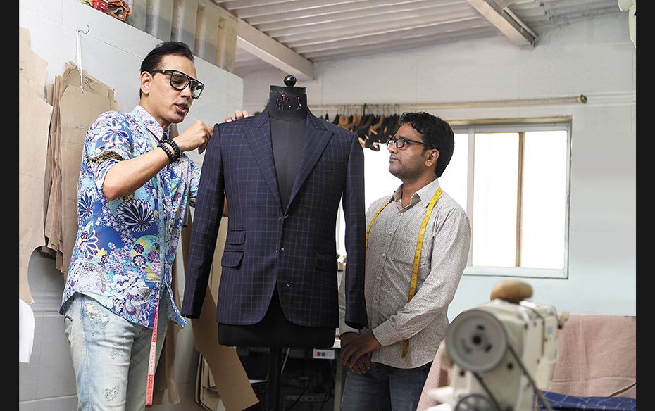 STAGE / 2 “I check every jacket on a mannequin before it reaches completion. a suit should bea