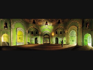 BARA IMAMBARA, LUCKNOWA man prays, facing eastwards towards Mecca, in one of the halls of the Bara I