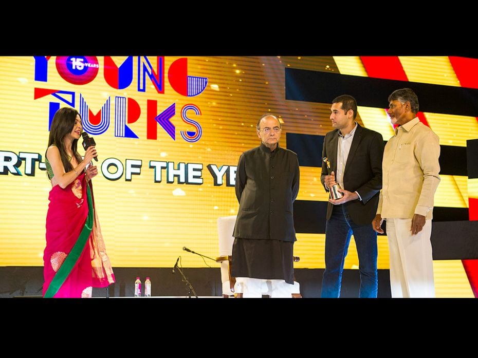 Chandrababu Naidu gives the Young Turk Startup of the Year award to Arvind Lakshmikumar, Founder of 