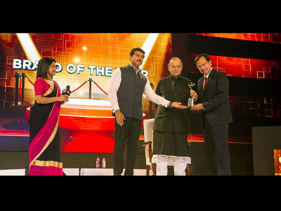 Rajyavardhan Singh Rathore gives the Brand of the Year award to Suresh Narayanan, CMD – Nestle