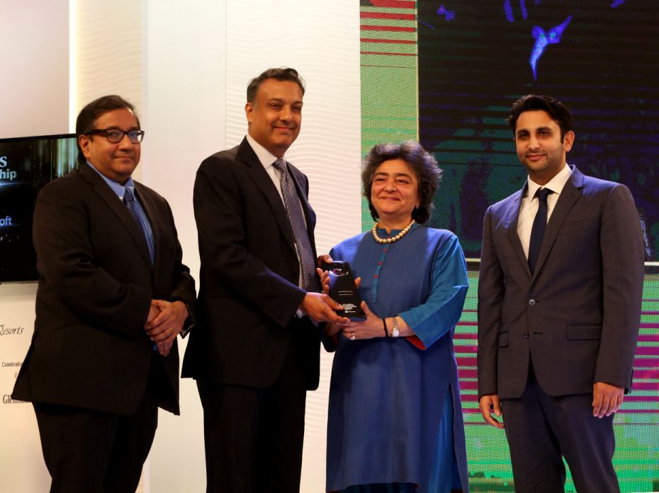 Sumant Sinha, founder and CEO, ReNew Power accepts the 'Outstanding Startup' award from AZB 