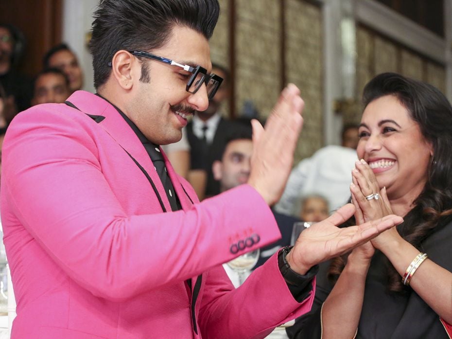 Actors Ranveer Singh and Rani Mukerji share a light moment at the event held at The Four Seasons, Mu