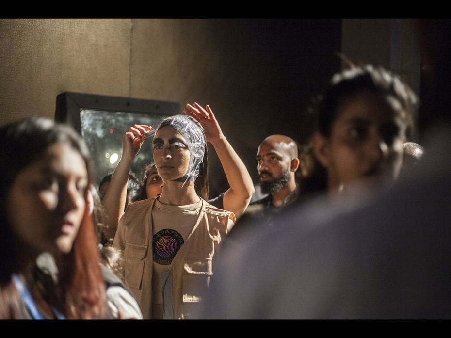 A model gets final touches just before she goes on the ramp for the StreetFeat show.