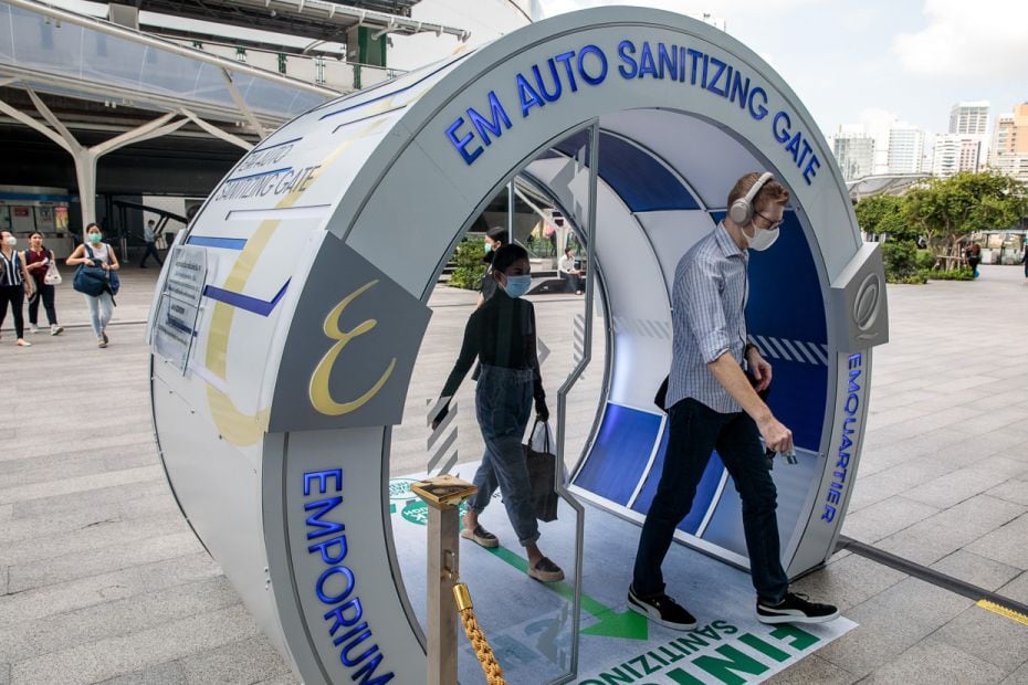 THAILAND: People walk through an 'EM Auto Sanitizing Gate', amid concerns over the spread of the cor