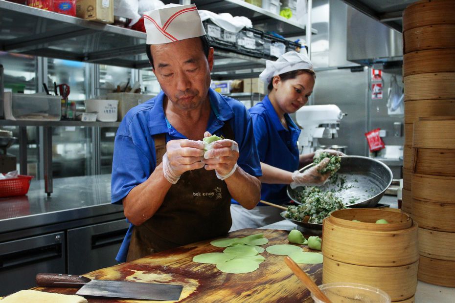 AUSTRALIA. Restaurant chefs prepare dumplings at the award winning Golden Century Seafood Restaurant