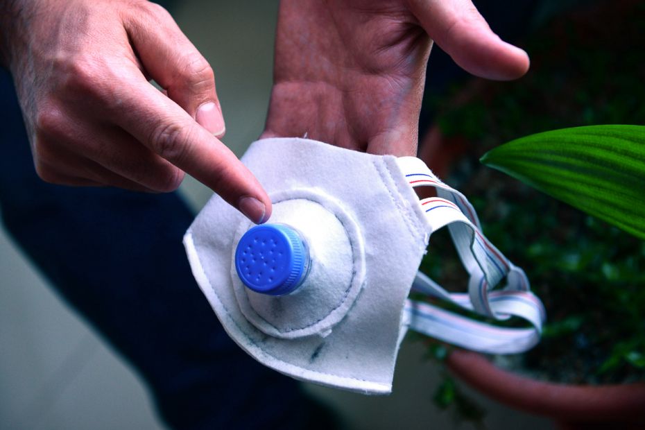 IRAQ: Cabbar Hasan, an innovative craftsman, sews face masks using fabric, water bottle caps, salt, 