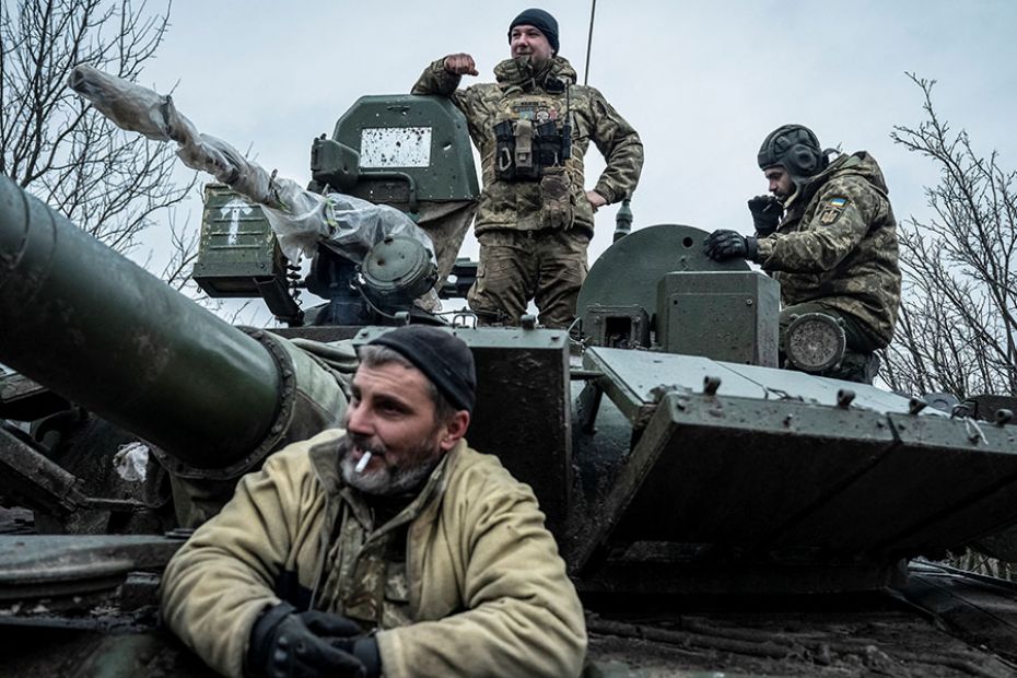 Service members of the Carpathian Sich Battalion, Ukraine, are seen on a tank on a frontline near Ly