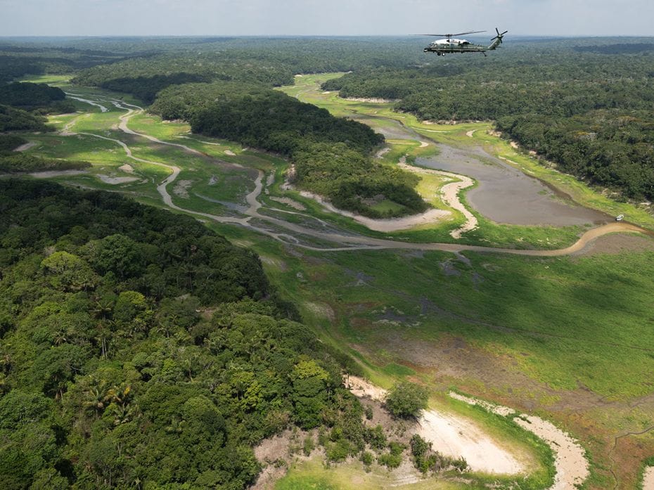 US President Joe Biden takes part in an aerial tour of the Amazon in Marine One during his visit to 