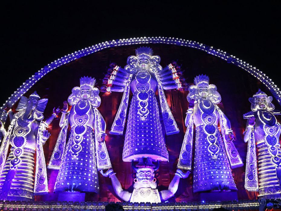 A 100-feet-long Durga and her consorts appear in an atypical form at this pandal near Kolkata on Oct