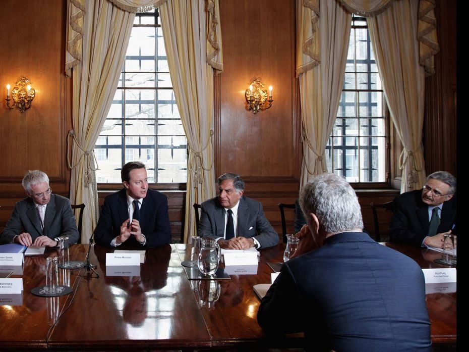 British Prime Minister David Cameron (C) chairs a meeting of the 'UK-India CEO Forum', at 10 Downing